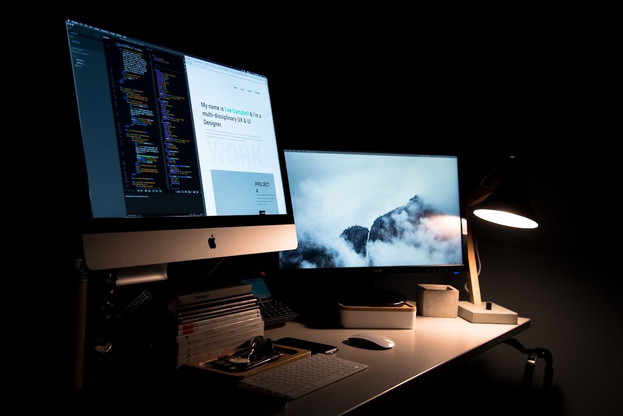 Developer laptop with clean website code for a conversion-focused business site build